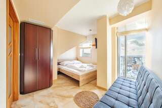 Апартаменты Apartamenty Sun & Snow Promenada Gwiazd Мендзыздрое Apartment with Sea View and Paid Parking-9